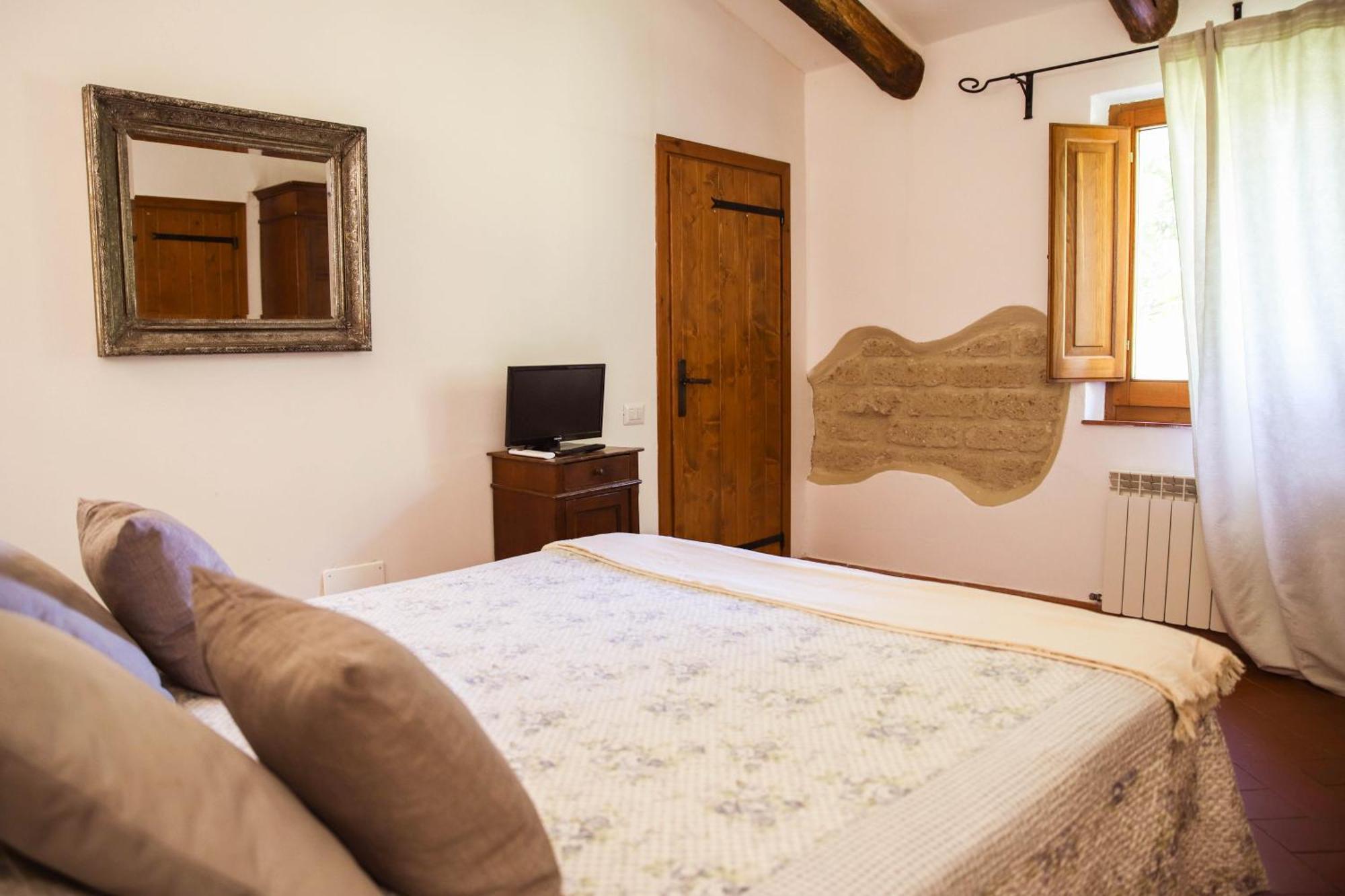 Bio Agriturismo Poggio Aione 萨杜勒尼亚 外观 照片