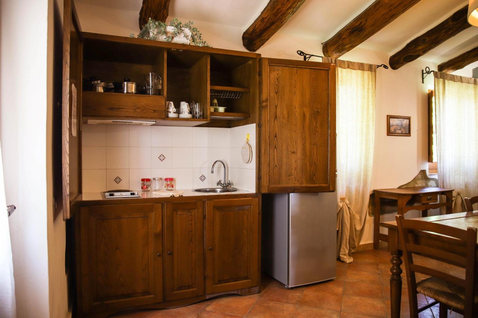 Bio Agriturismo Poggio Aione 萨杜勒尼亚 外观 照片
